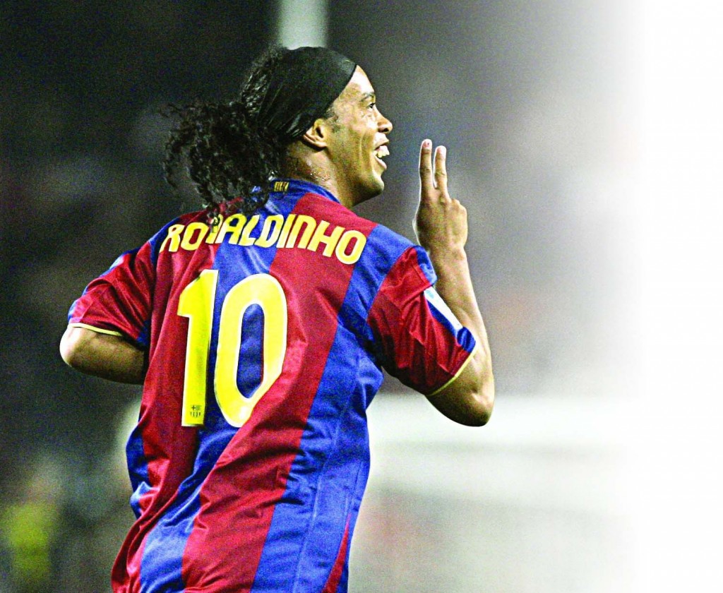 5/11/2007 - BARCELONA: Ronaldinho from Brazil celebrates his goal against Betis during his Spanish league soccer match at the Camp Nou Stadium in Barcelona, Spain - AP Photo. [International, Barcelona, Spain, Ronaldinho, Brazil, Soccer, Football]